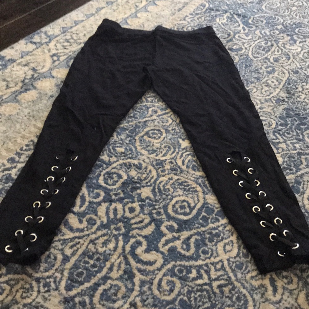 Place pants laces on back